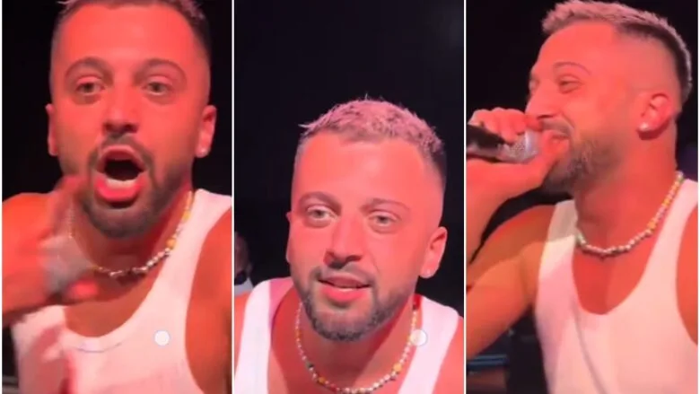 videoja-behet-virale-–-reagimi-i-gjestit-kur-nje-fans-i-dhuron-kartelen-e-bankes-ne-koncert